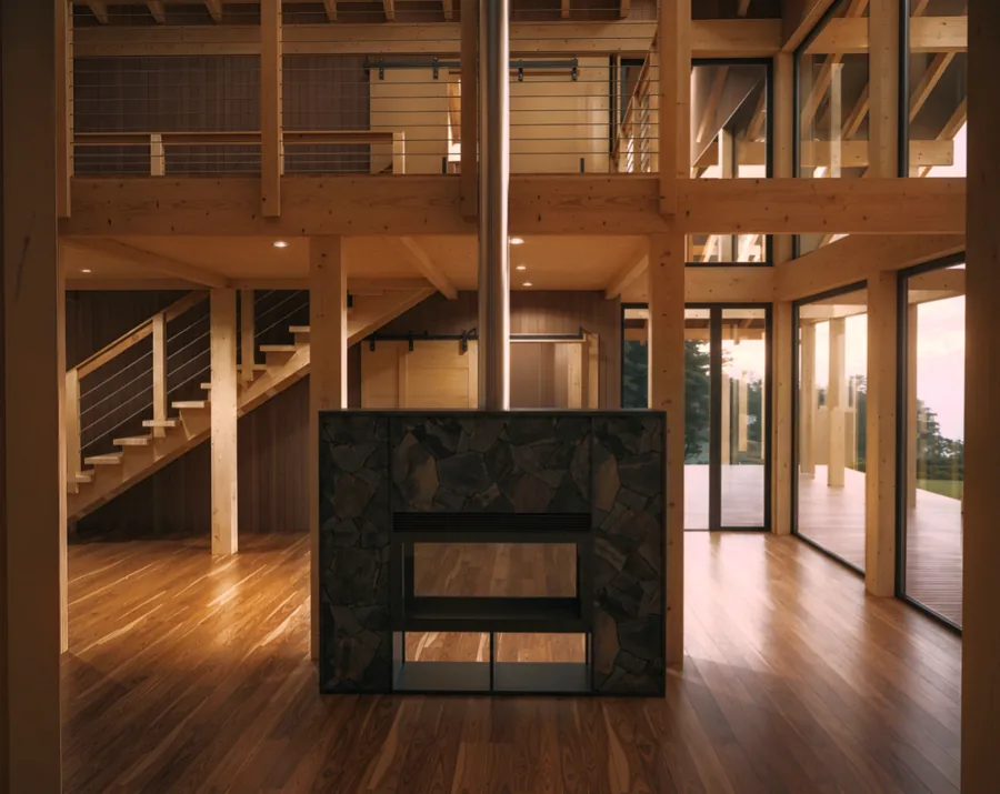 Estar de madera y chimenea de Casa Austral